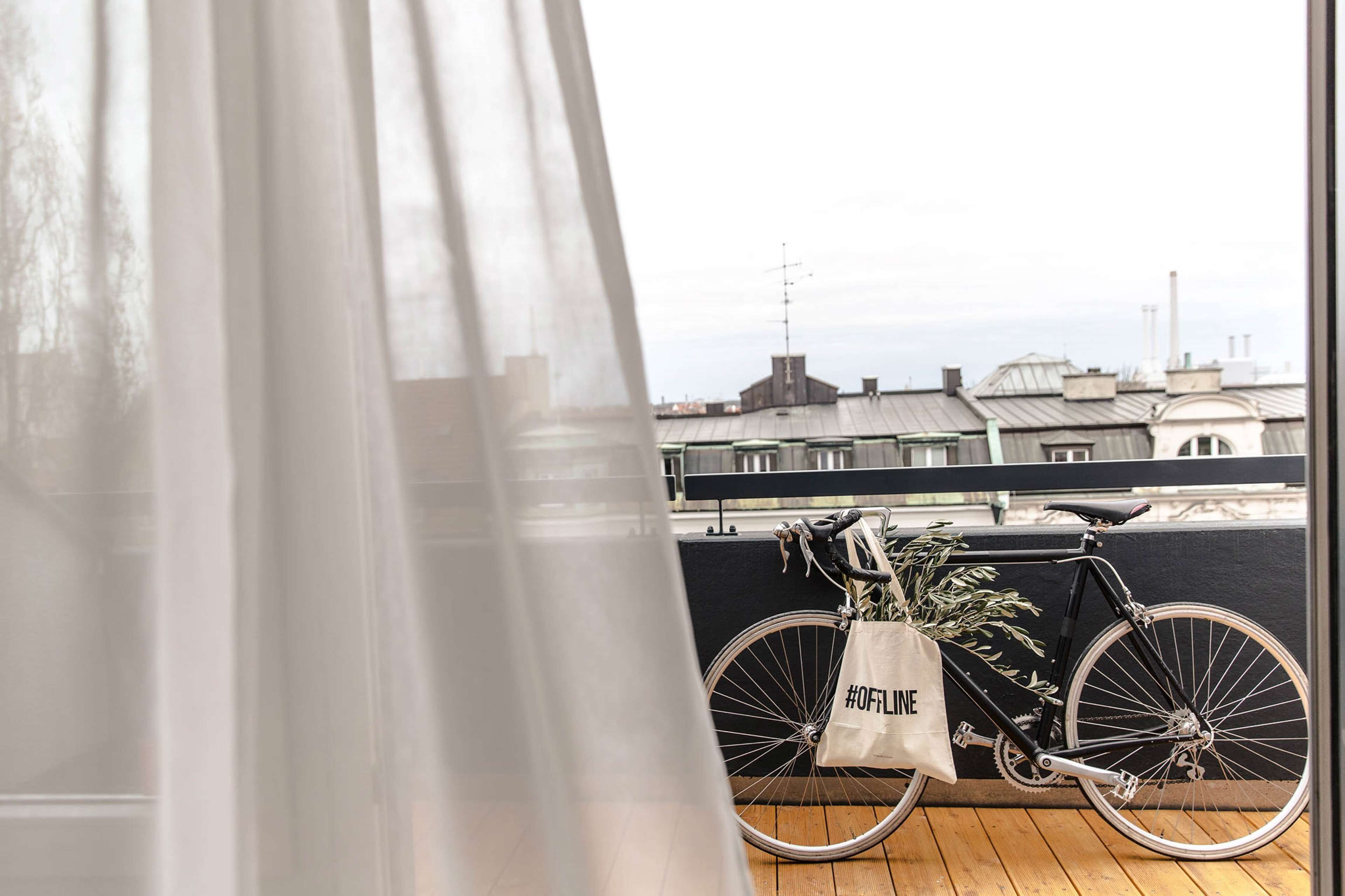 bold rooftop studio with balkony | bicycling