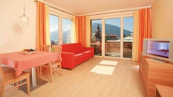 Habitación doble superior (Fiori) | Área de sala de estar