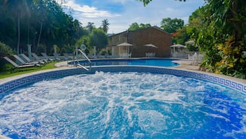 Outdoor pool, open 10:00 AM to 9:00 PM, pool umbrellas, pool loungers