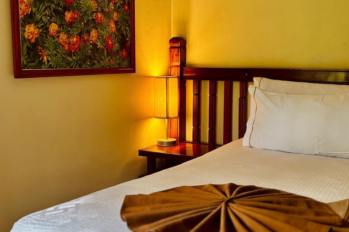 Deluxe Room | 1 bedroom, in-room safe, laptop workspace, blackout curtains