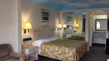 Tabla de planchar con plancha, wifi gratis y ropa de cama