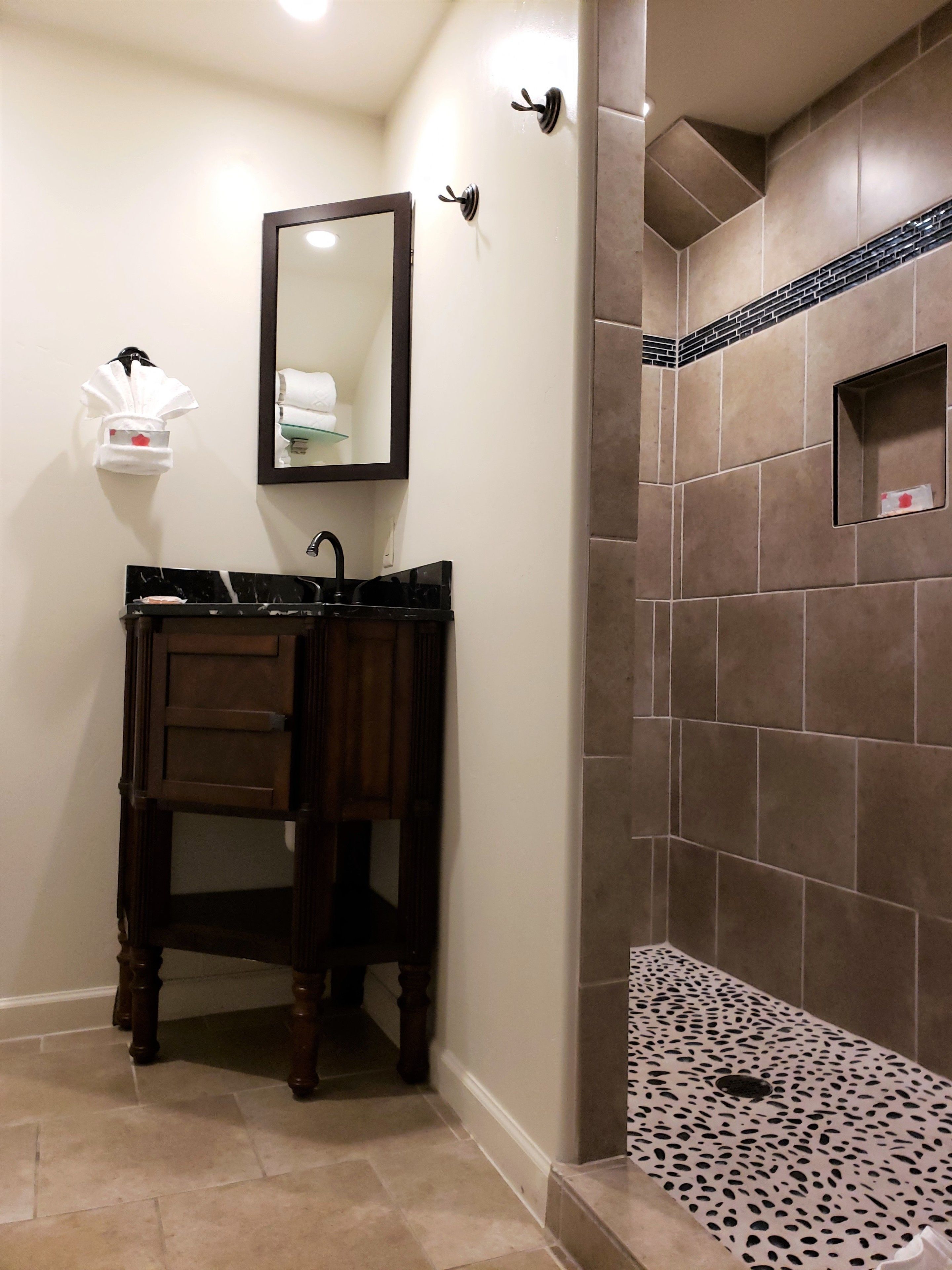 room, 2 queen beds | bathroom | rainfall showerhead, designer toiletries, hair dryer, towels