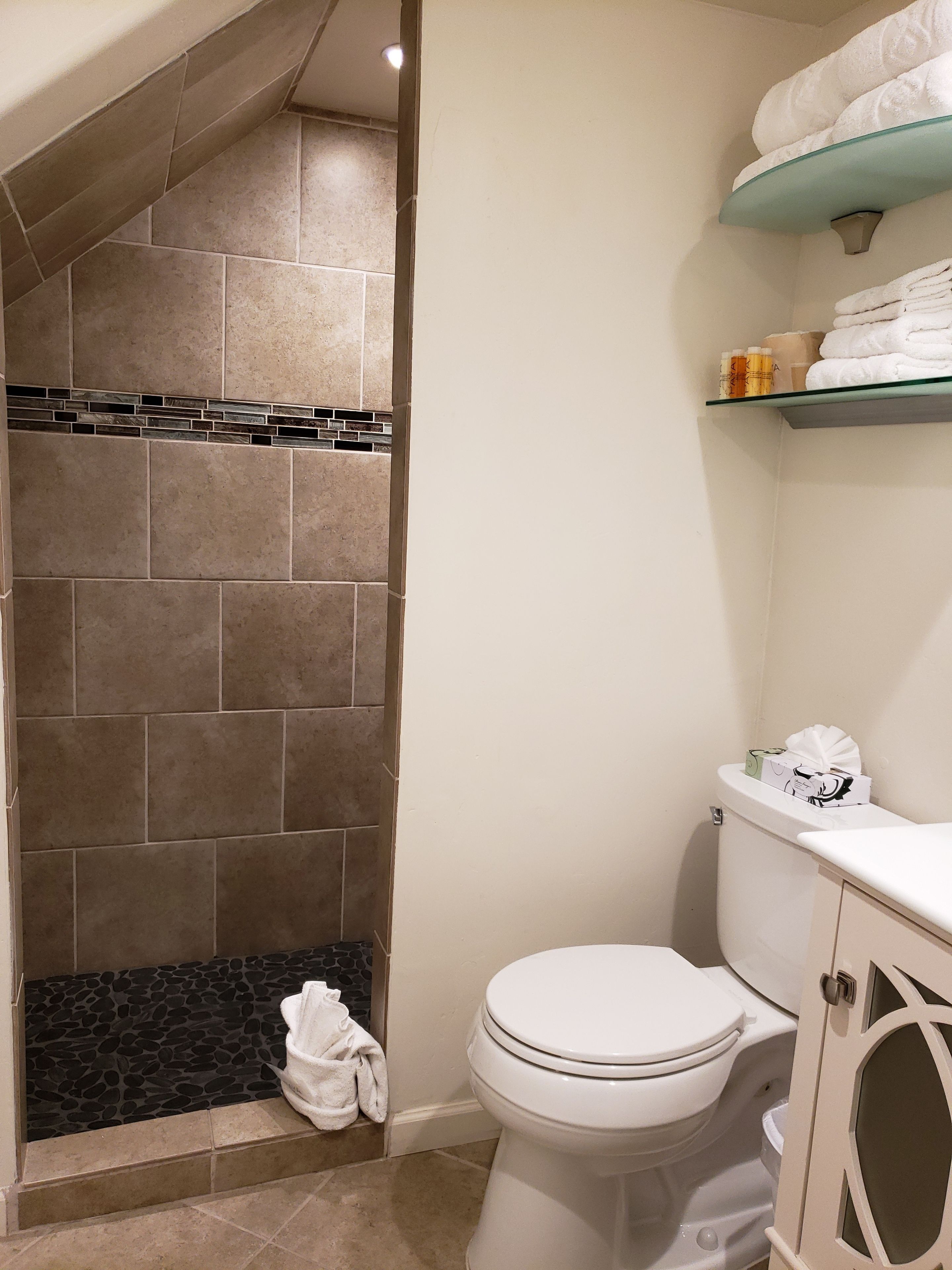 room, 2 queen beds | bathroom | rainfall showerhead, designer toiletries, hair dryer, towels