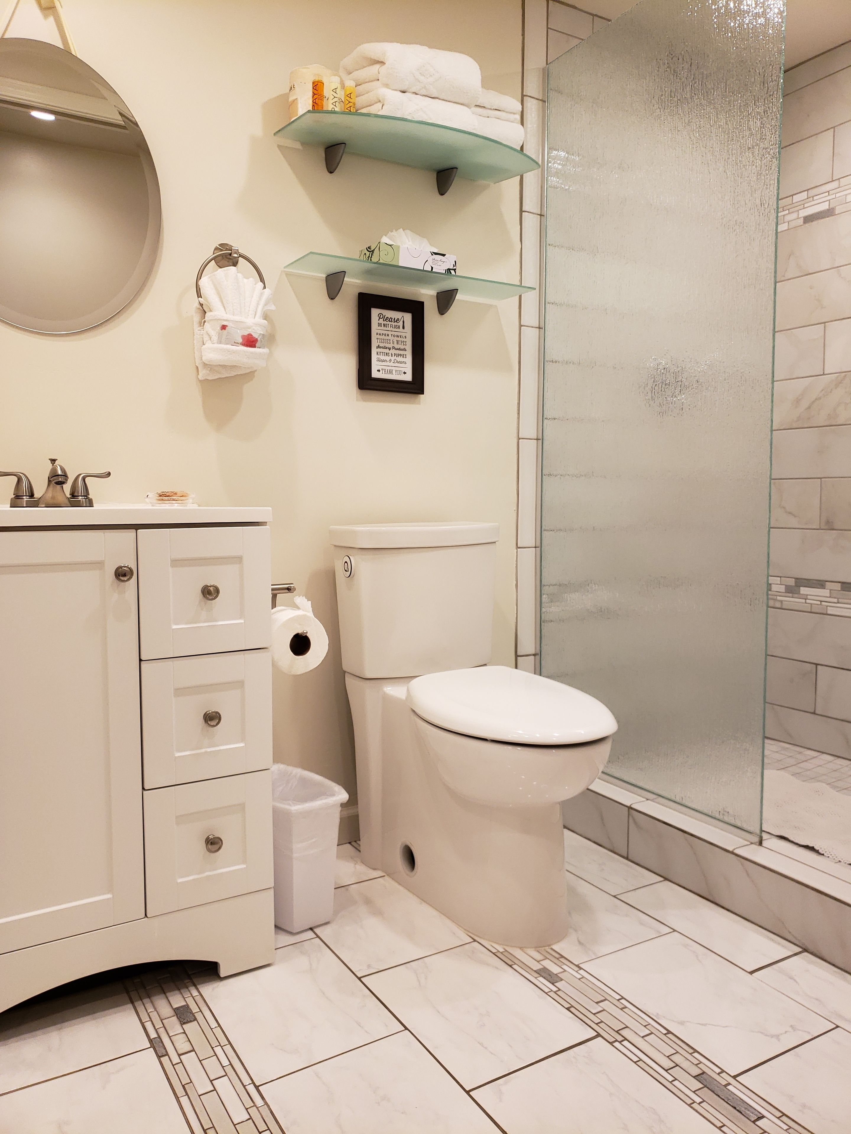 room, 1 king bed | bathroom | rainfall showerhead, designer toiletries, hair dryer, towels