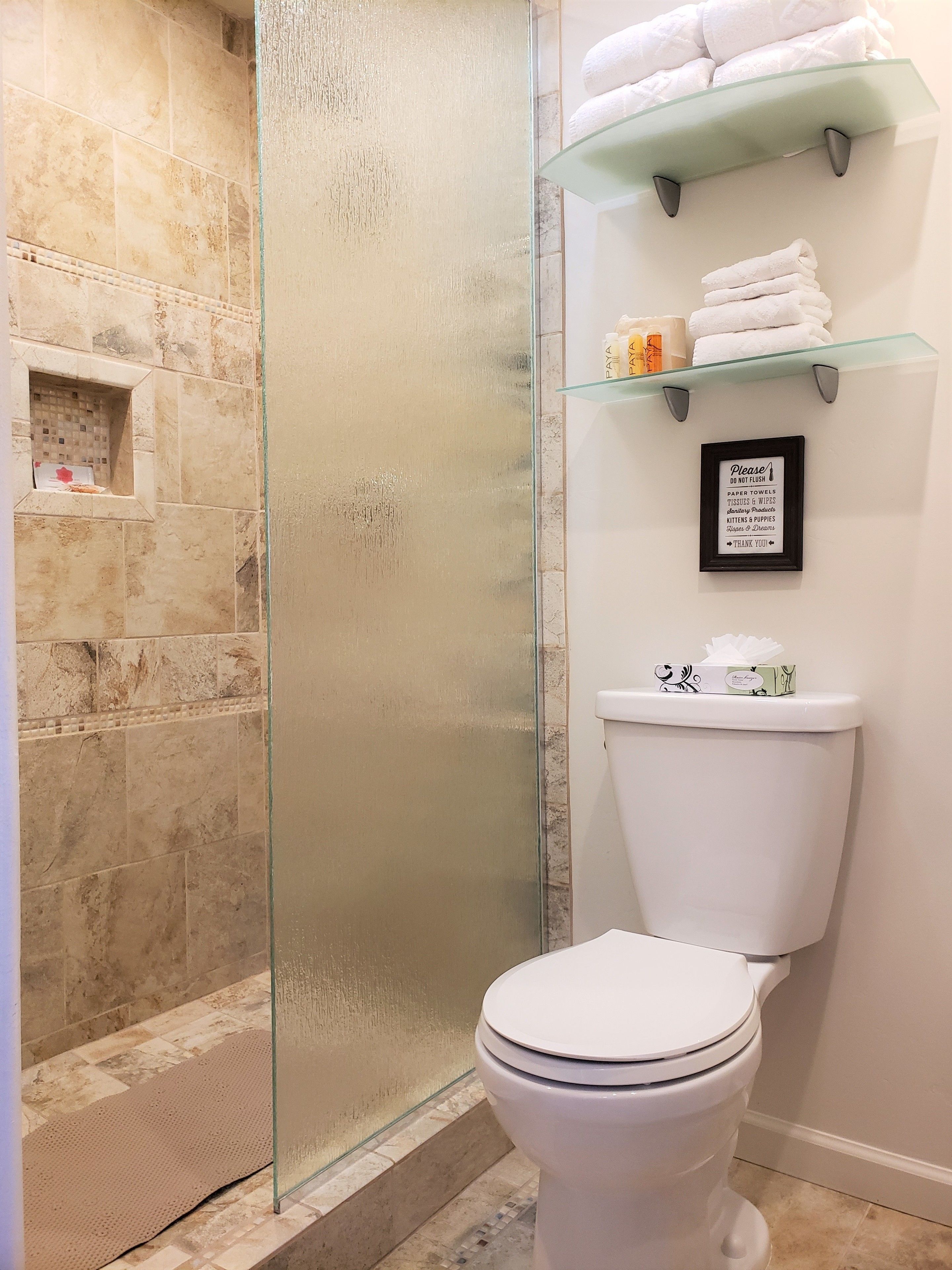 rainfall showerhead, designer toiletries, hair dryer, towels