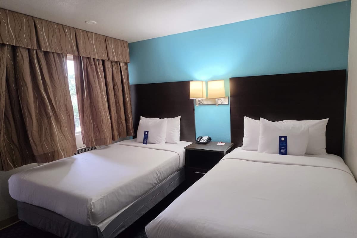 Room, 2 Queen Beds, Non Smoking (Pet-Friendly) | WiFi (free), individually decorated, individually furnished, bed sheets
