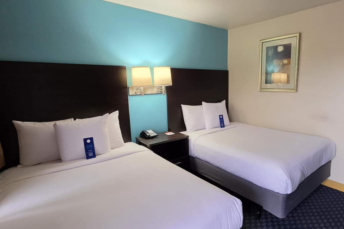 Room, 2 Queen Beds, Non Smoking | WiFi (free), individually decorated, individually furnished, bed sheets