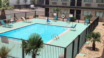 Outdoor pool, open 9:00 AM to 9:00 PM, sun loungers