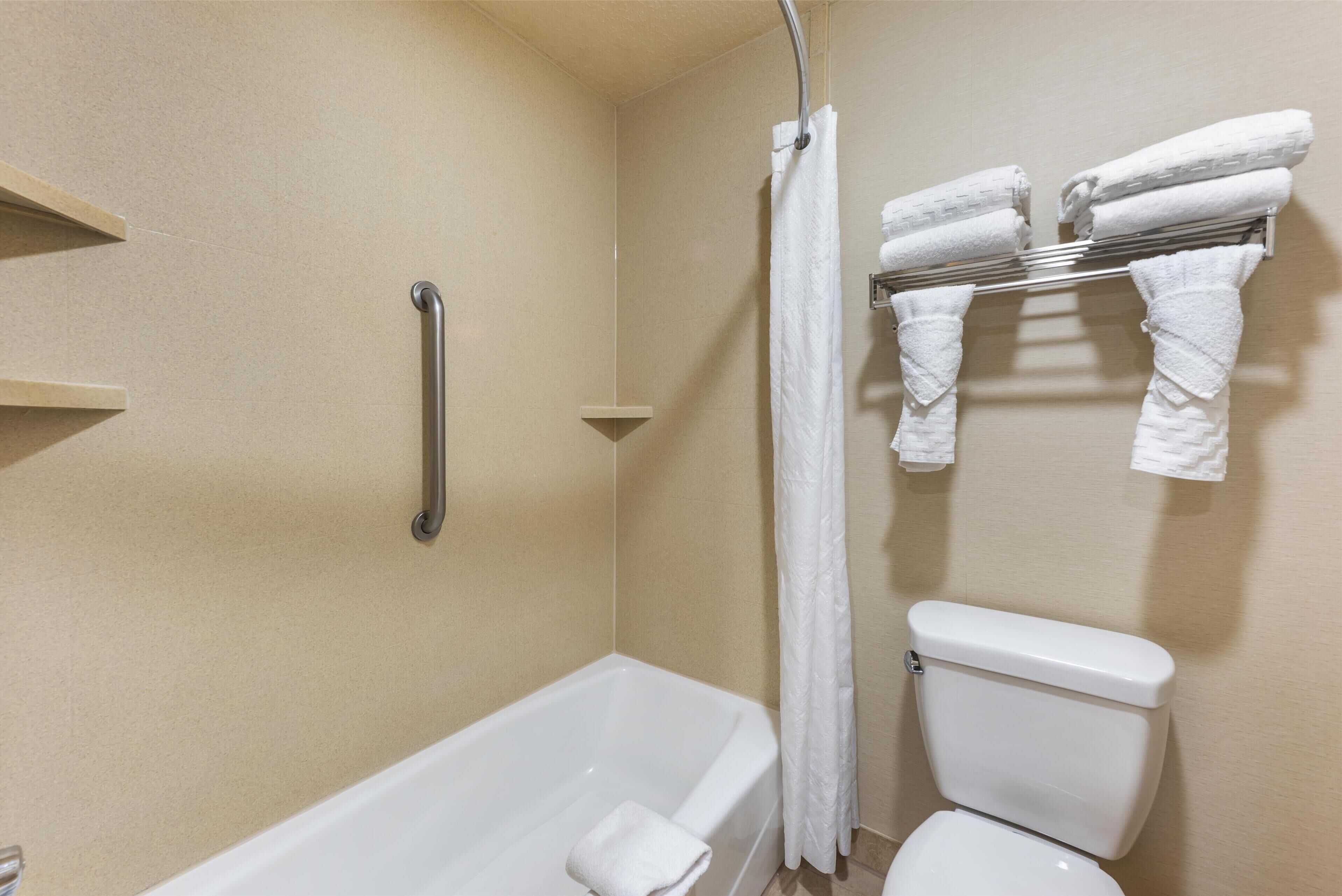 standard room, 2 queen beds, refrigerator & microwave, poolside | bathroom | combined shower/bathtub, free toiletries, hair dryer, towels