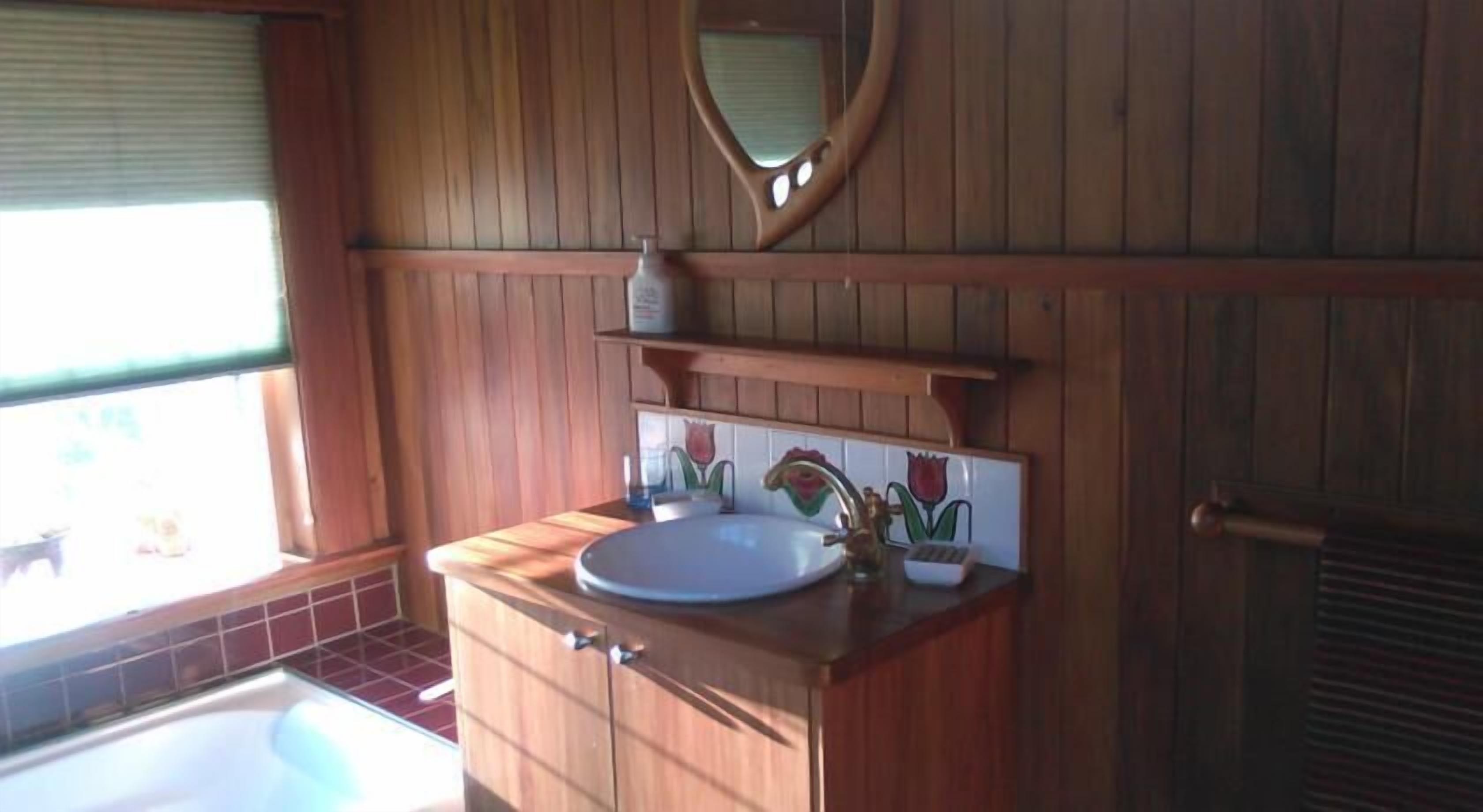 the den - shared bathroom | bathroom | eco-friendly toiletries, towels