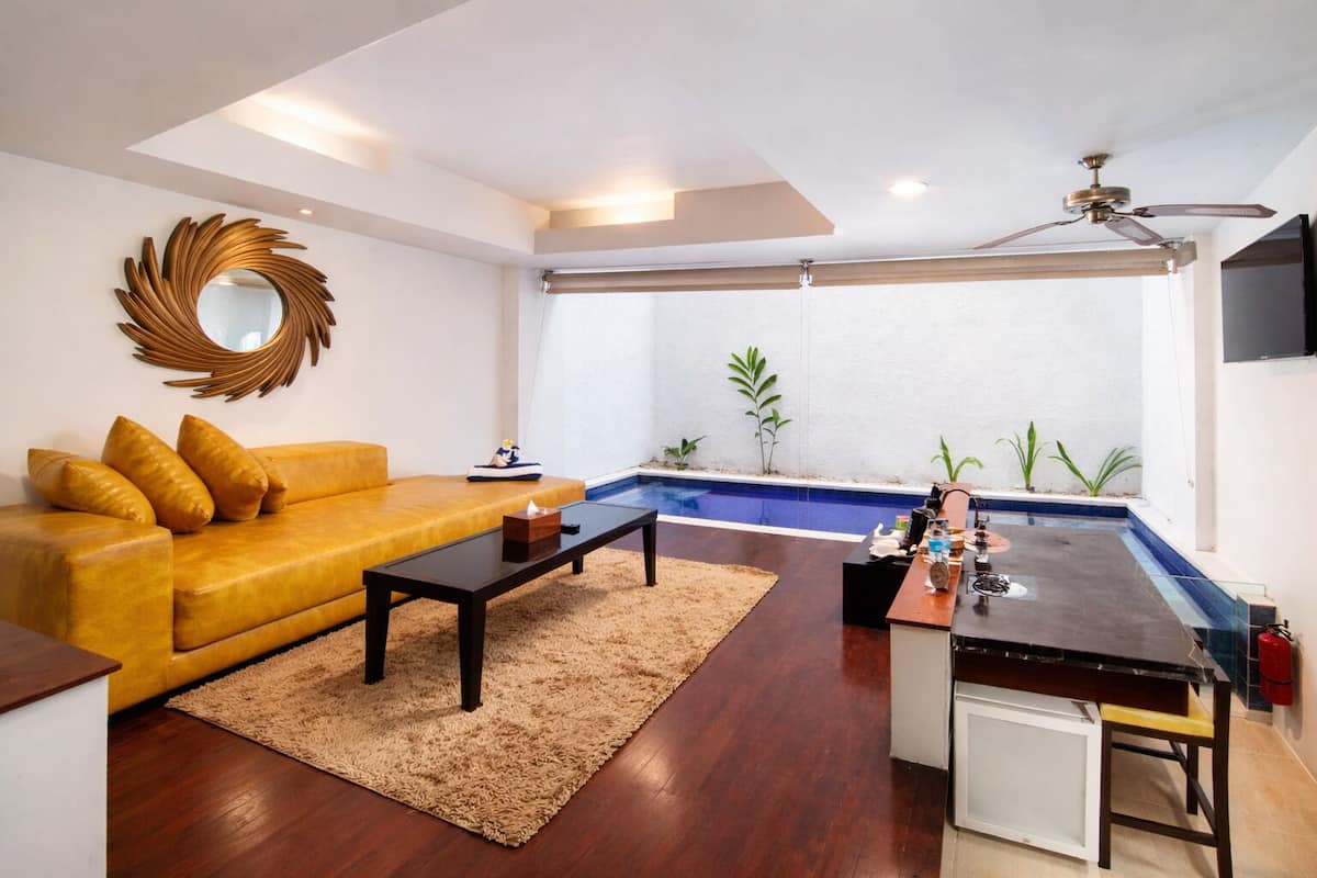 Signature-Suite, 1 Schlafzimmer, eigener Pool (Loft) | Wohnzimmer