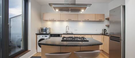 Superior Penthouse, Ocean View, Oceanfront | Private kitchen | Full-size fridge, microwave, stovetop, dishwasher