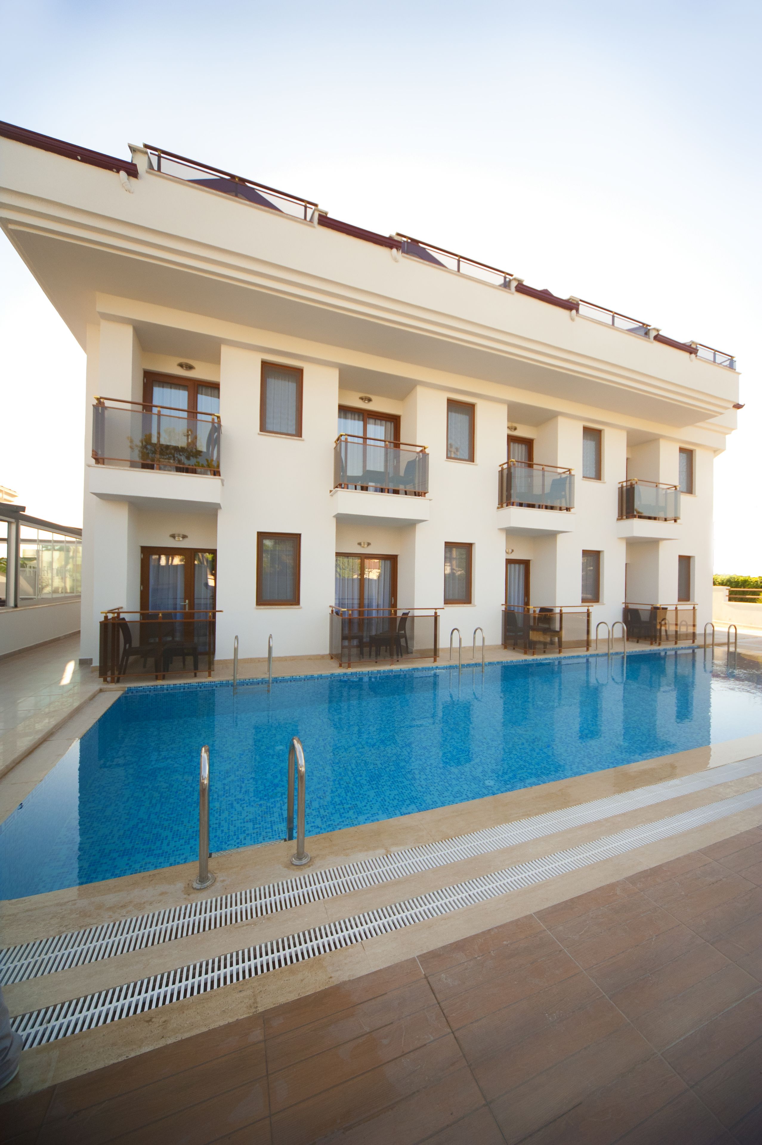 Seasonal outdoor pool, pool umbrellas, sun loungers
