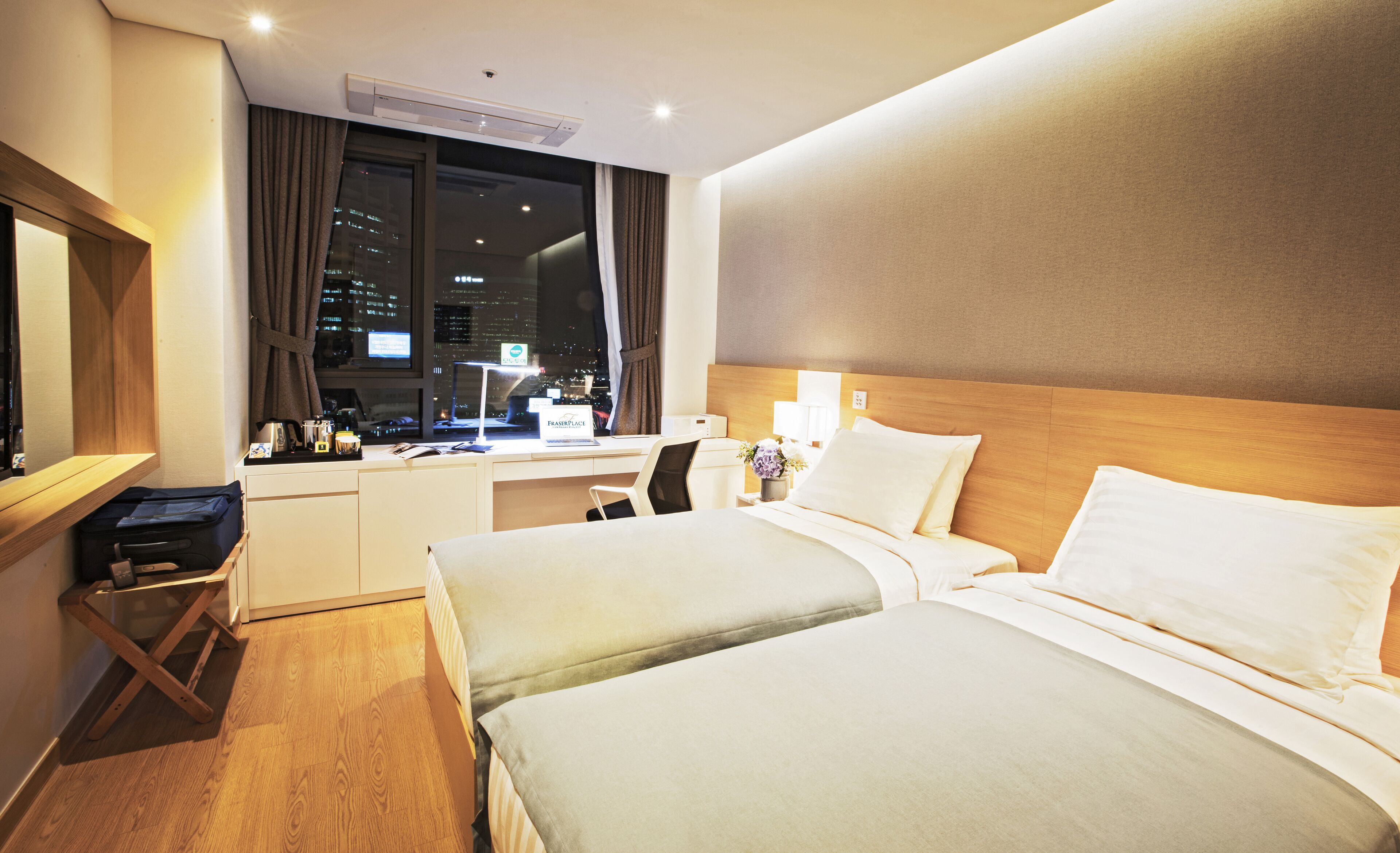 superior room, 2 single beds | in-room safe, desk, laptop workspace, blackout curtains