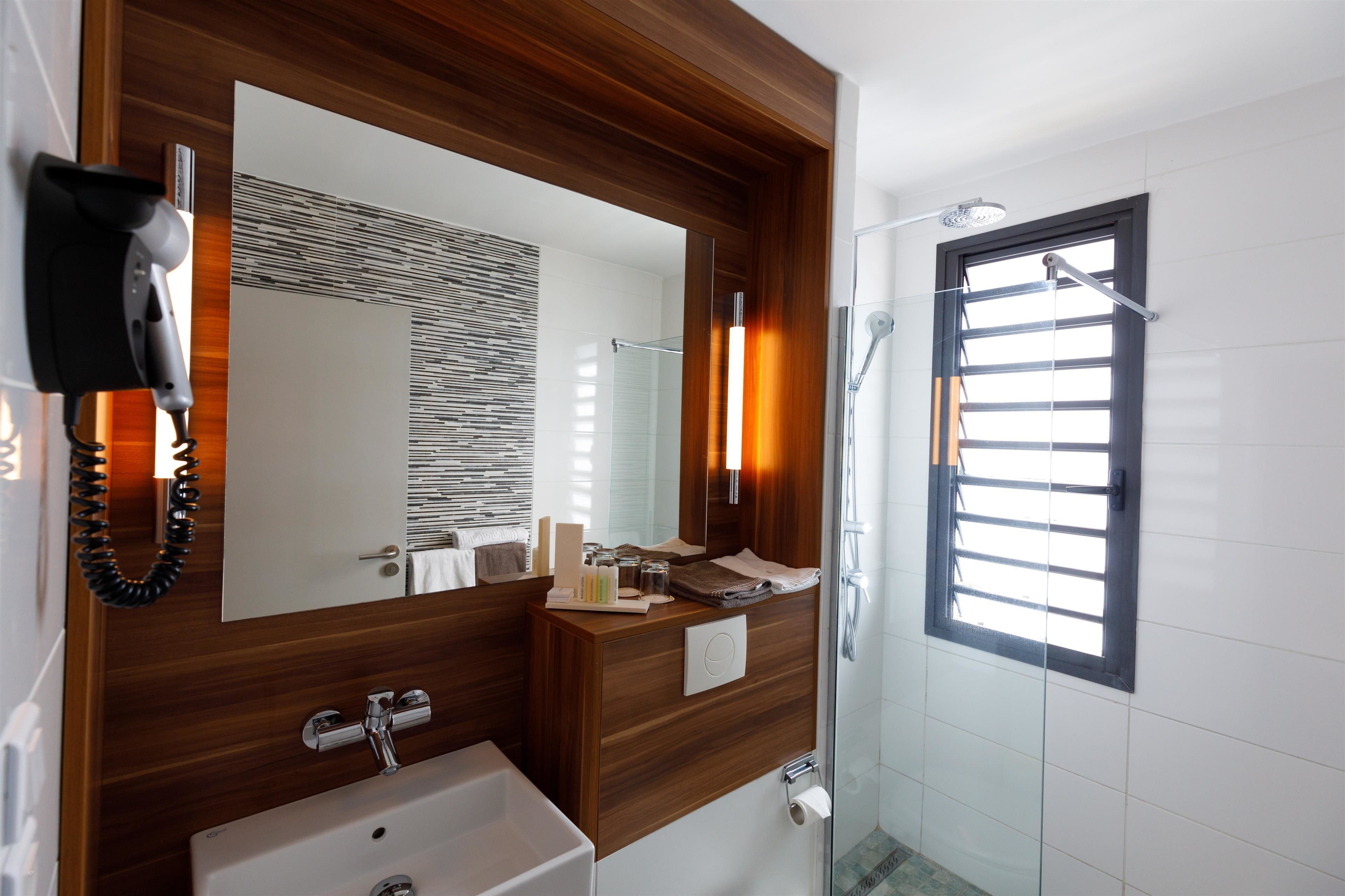 eco-friendly toiletries, hair dryer, towels