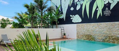 Outdoor pool, open 8:00 AM to 8:00 PM, sun loungers