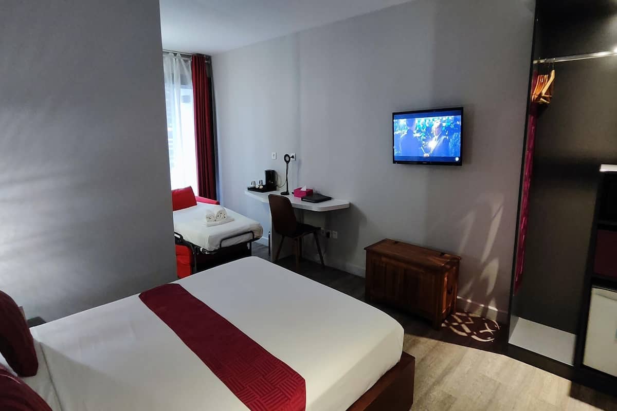 Standard Room, Multiple Beds | Minibar, in-room safe, individually furnished, laptop workspace