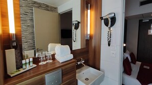 Eco-friendly toiletries, hair dryer, towels