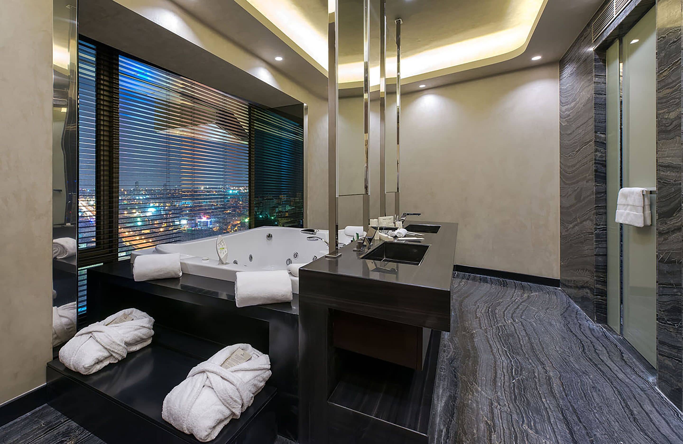 presidential suite | bathroom | hair dryer, bathrobes, towels