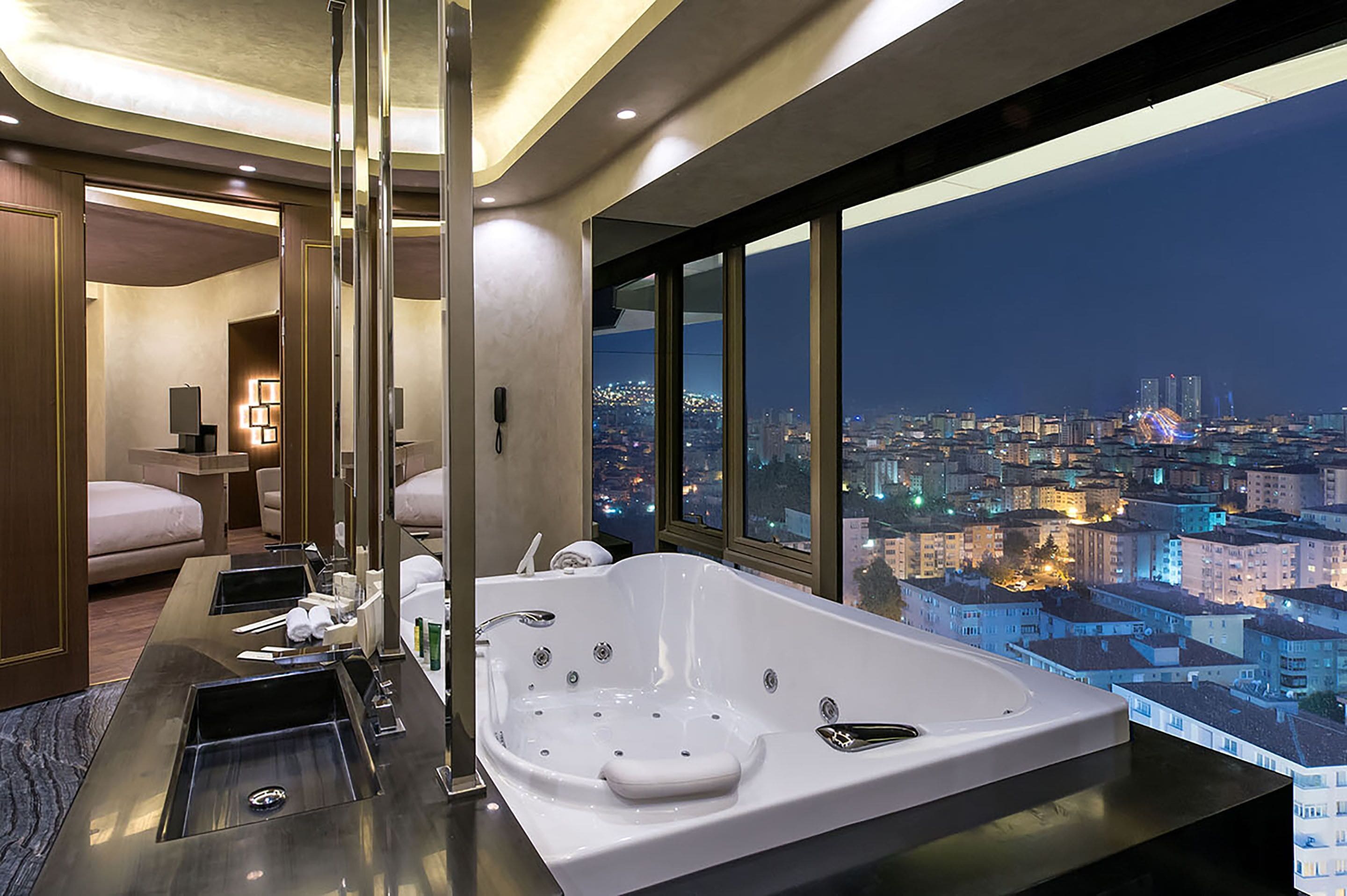 presidential suite | bathroom | hair dryer, bathrobes, towels