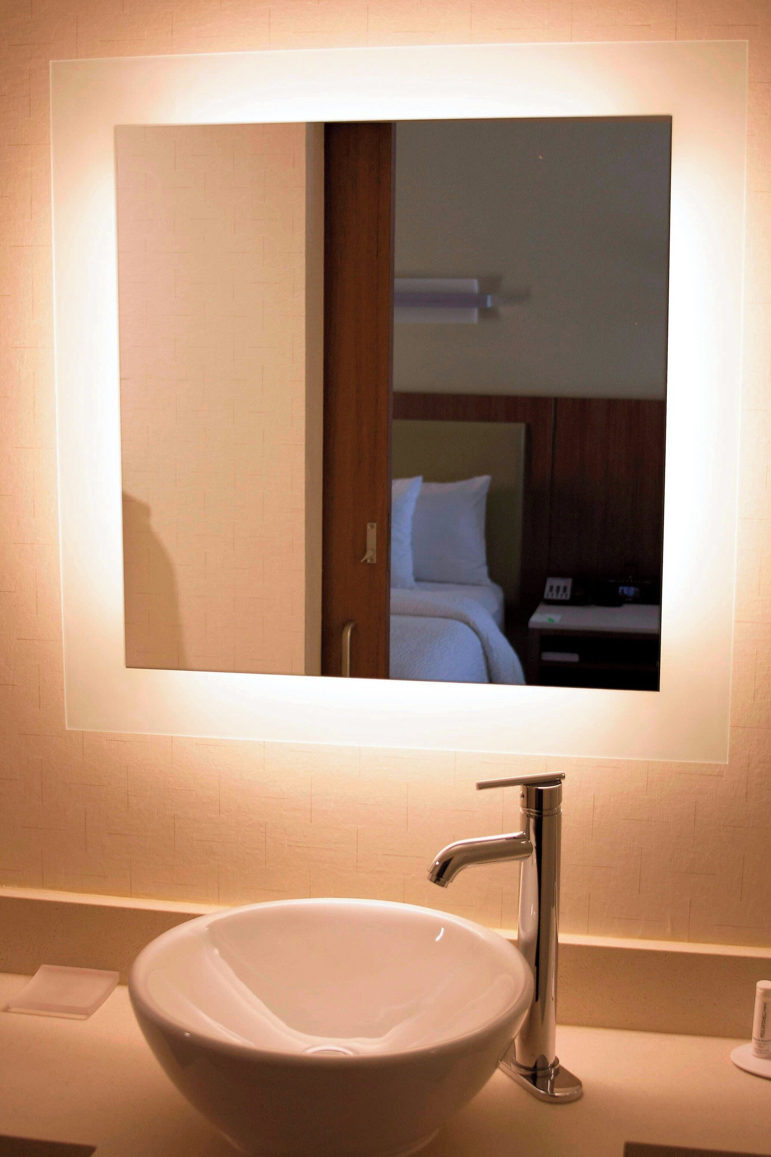 shower, designer toiletries, hair dryer, towels