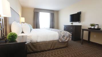 Premium bedding, pillow-top beds, desk, laptop workspace