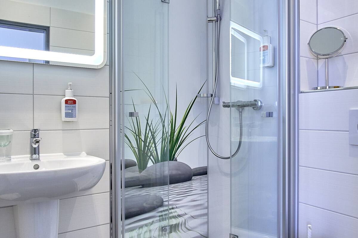 shower, eco-friendly toiletries, hair dryer, heated floors