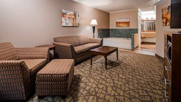 Suite, 1 kingsize bed, niet-roken, bubbelbad (with Sofabed) | Een kluis op de kamer, een bureau, een laptopwerkplek