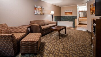 Suite, 1 King Bed, Non Smoking, Hot Tub (with Sofabed) | In-room safe, desk, laptop workspace, iron/ironing board