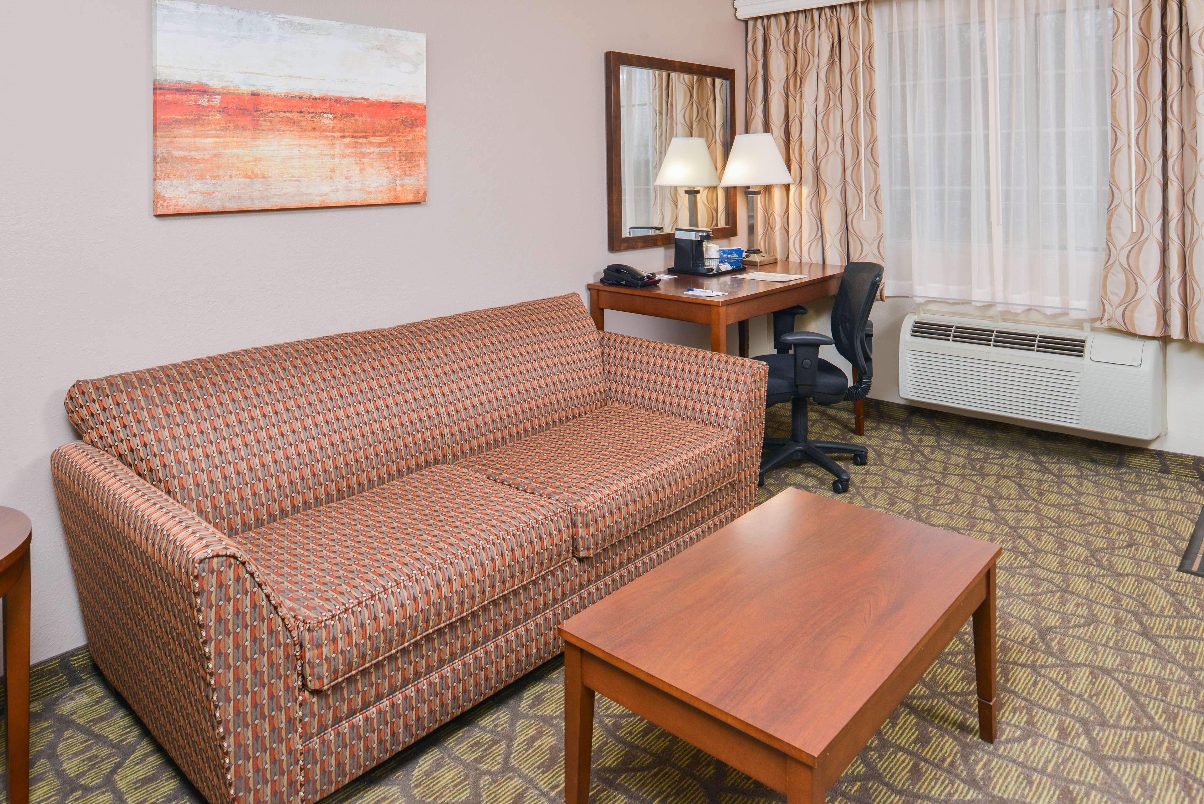 suite, 1 queen bed, non smoking, refrigerator (with sofabed) | in-room safe, desk, laptop workspace, iron/ironing board