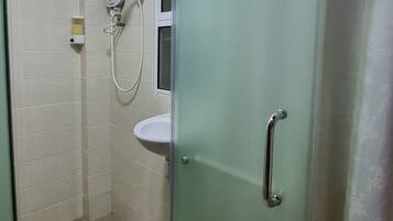 Shower, rainfall showerhead, hair dryer, towels