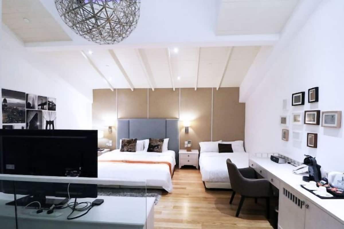 1 dormitorio, edredones de plumas, minibar con artículos gratuitos