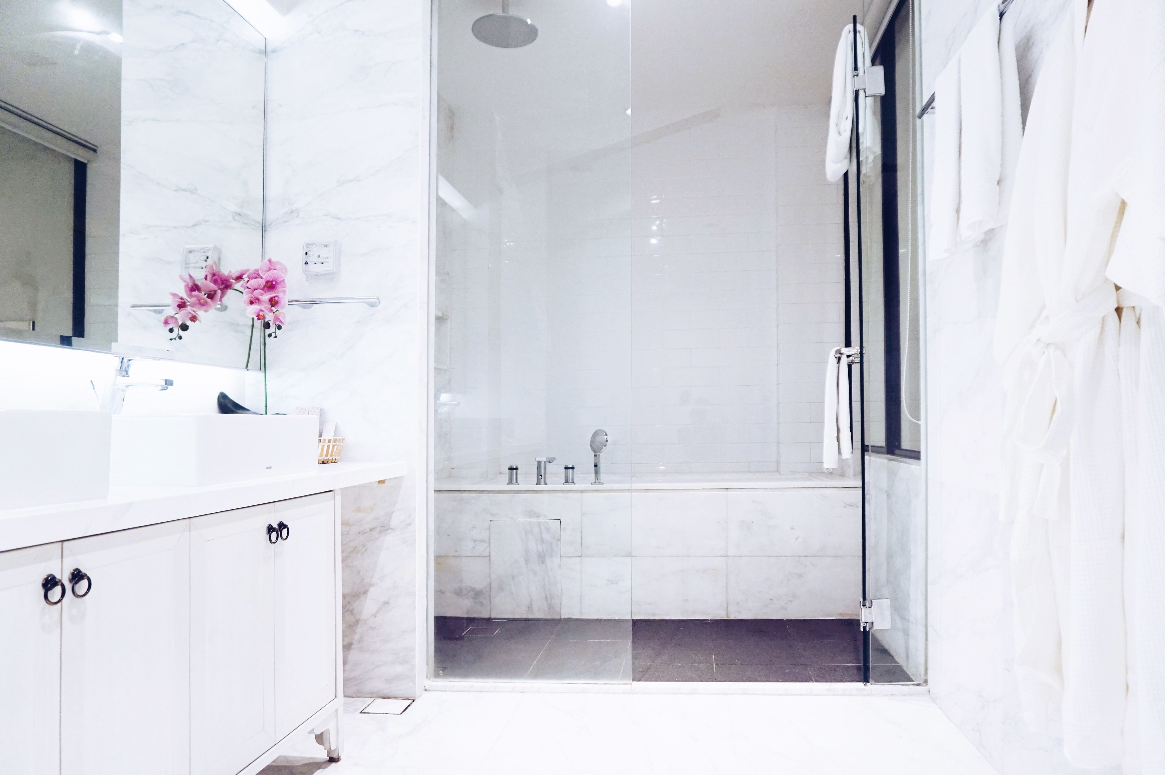 family suite, multiple beds | bathroom | free toiletries, hair dryer, slippers, towels