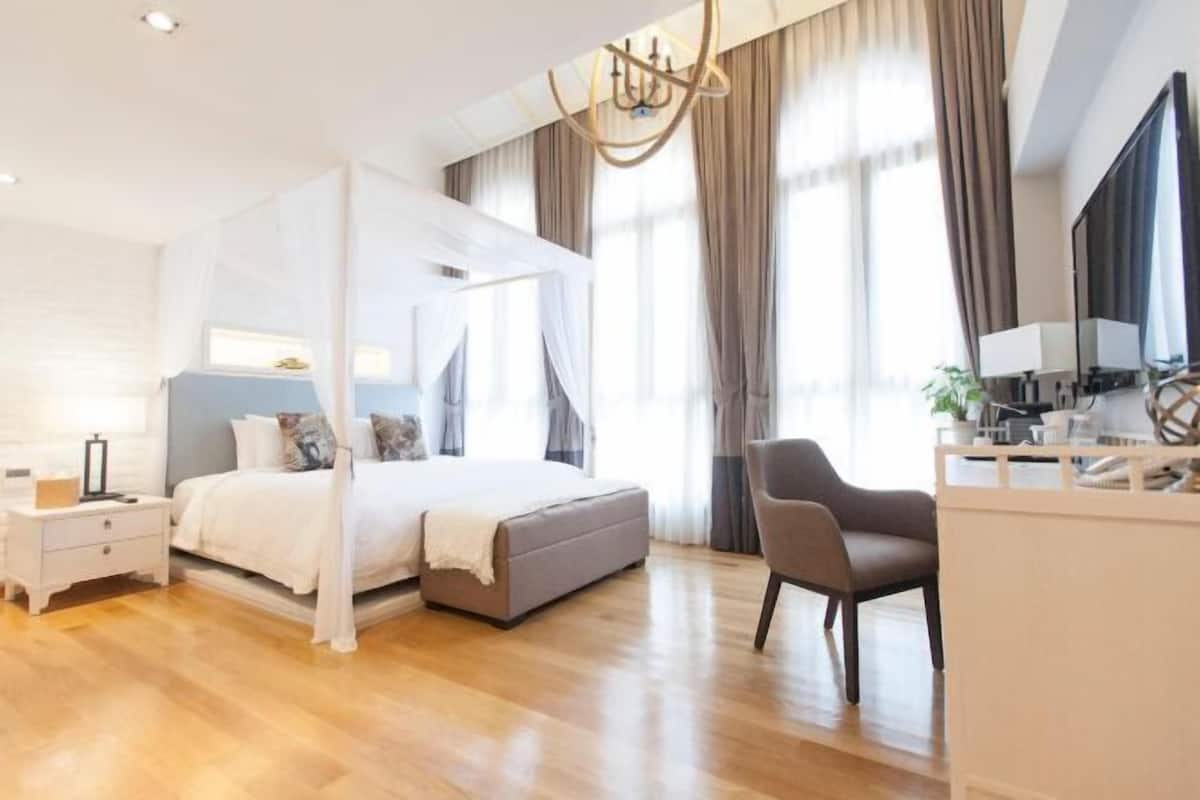 1 dormitorio, edredones de plumas, minibar con artículos gratuitos