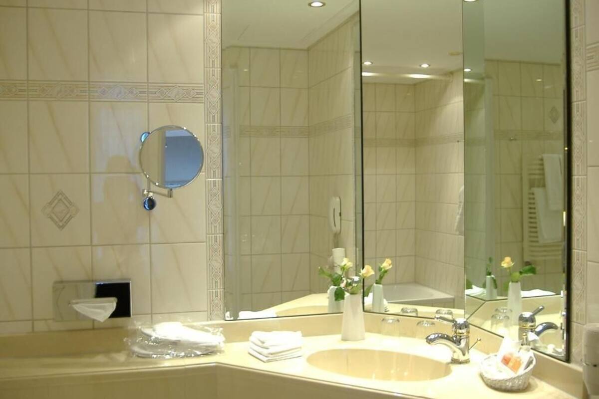 hair dryer, bathrobes, towels