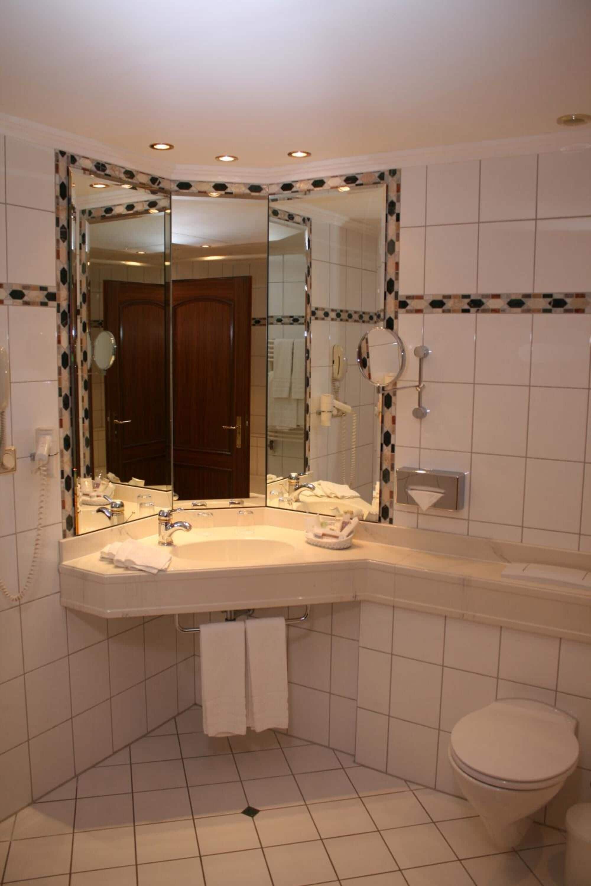 hair dryer, bathrobes, towels