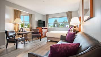 Premium bedding, desk, laptop workspace, blackout curtains