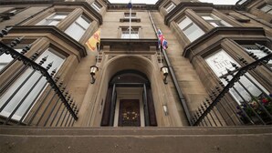 A historic building with a grand entrance, featuring a central archway and symmetrical windows. - Palmerston Suites (Edinburgh)