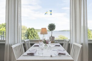 Breakfast, lunch, dinner served; Scandinavian cuisine, beach views 