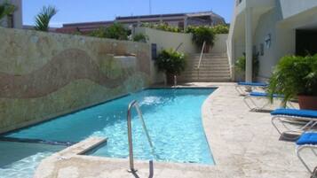 Outdoor pool, pool umbrellas, pool loungers