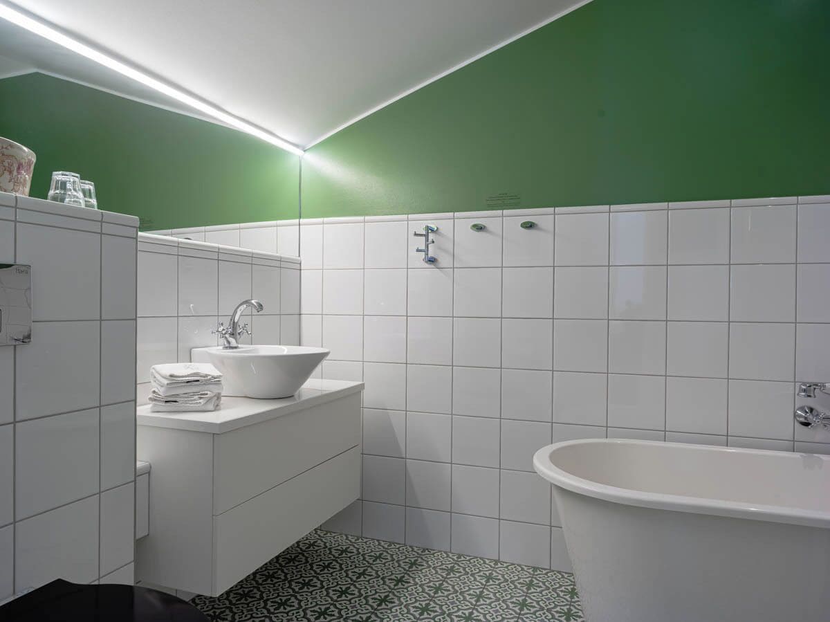 suite | bathroom | hair dryer, towels, soap, shampoo