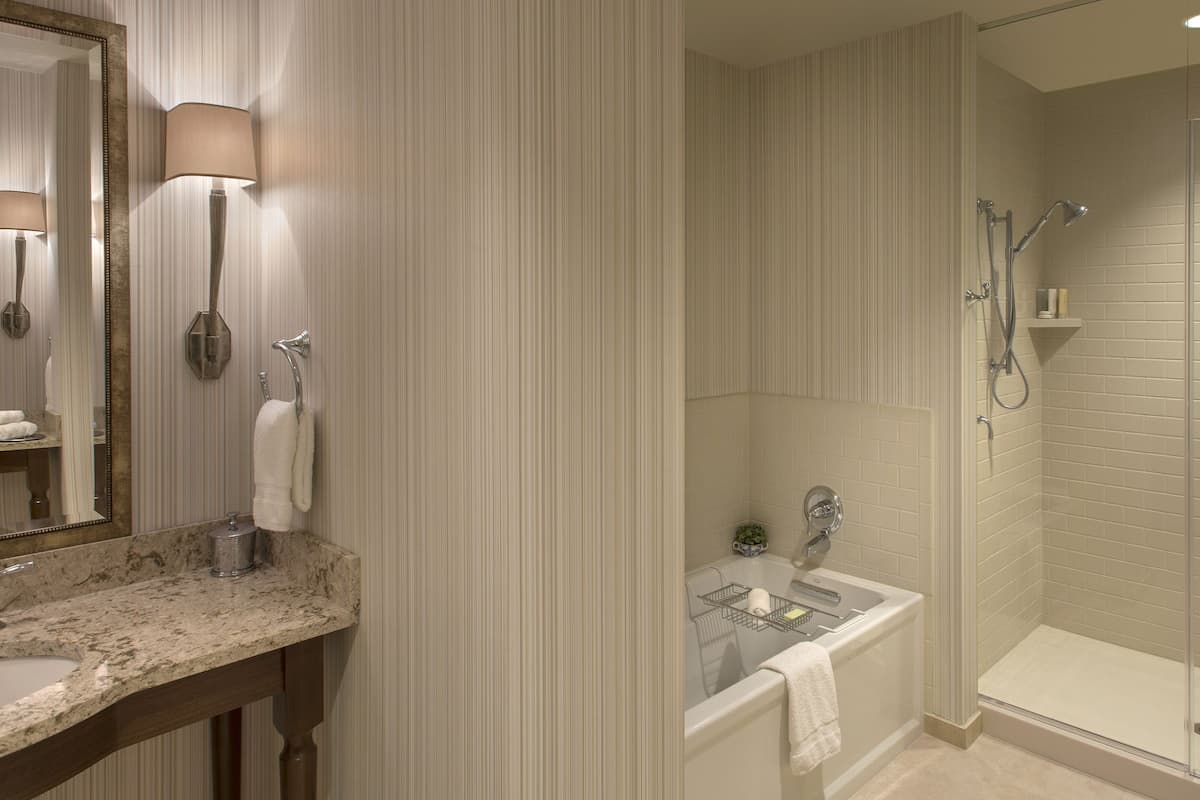 king suite | bathroom | shower, designer toiletries, hair dryer, towels