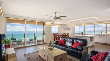 Three Bedroom Beachfront Premium Apartment | Living area | TV, DVD player