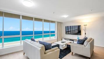 Three Bedroom Beachfront Standard Apartment | Living area | TV, DVD player