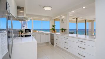 Three Bedroom Beachfront Premium Apartment | Private kitchen | Fridge, microwave, stovetop, dishwasher