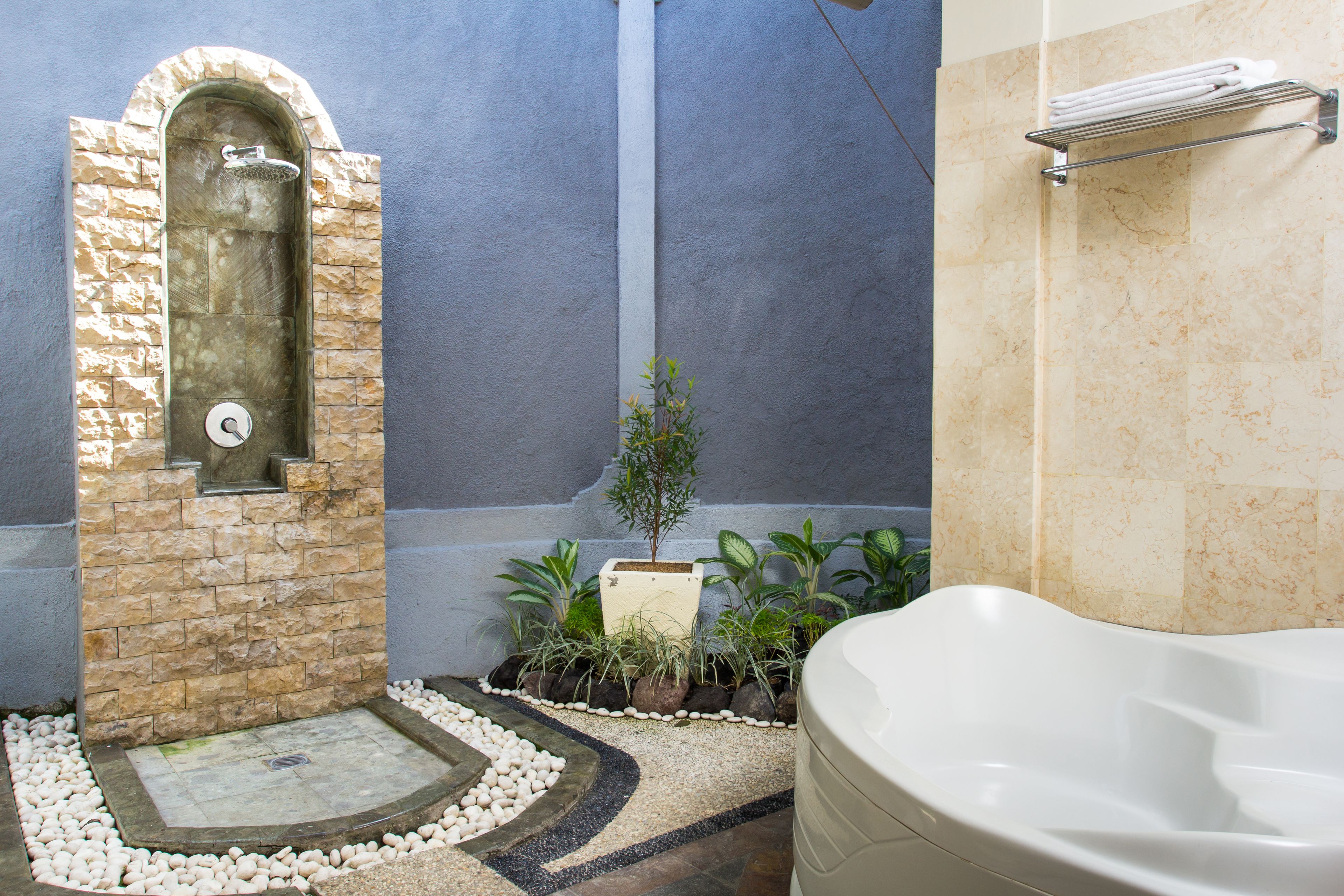 Shower, hair dryer, slippers, towels