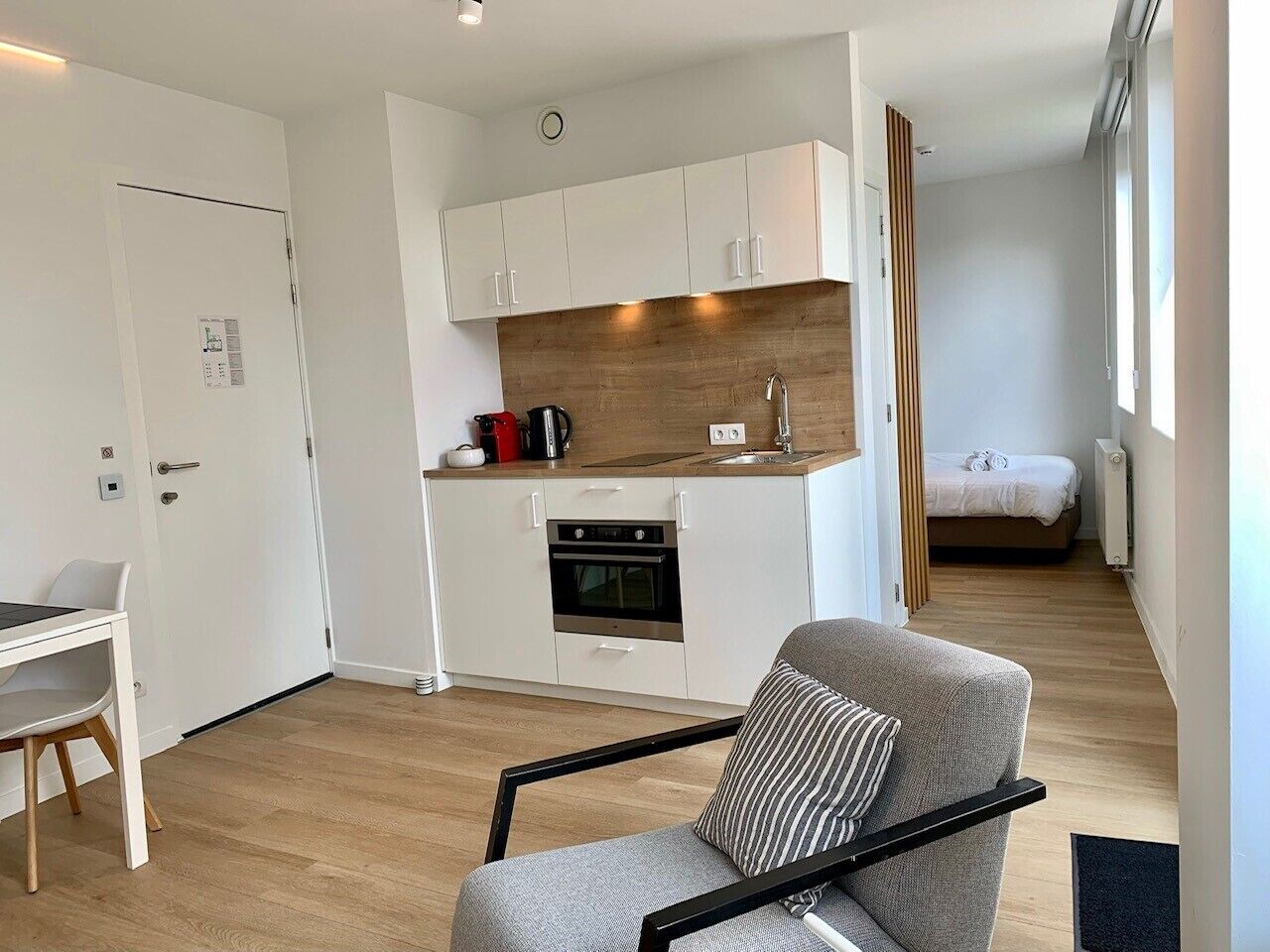 deluxe studio, 1 single bed | private kitchen | full-sized fridge, microwave, stovetop, espresso maker