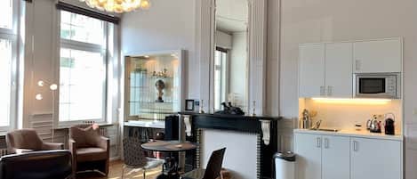 Superior Apartment, 1 King Bed | Living area | Flat-screen TV
