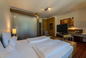 Hypo-allergenic bedding, in-room safe, desk, laptop workspace