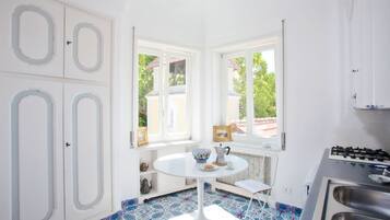 Suite Junior, vista mare | Cucina privata